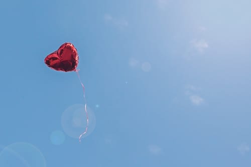 man arrested for releasing heart shaped balloons